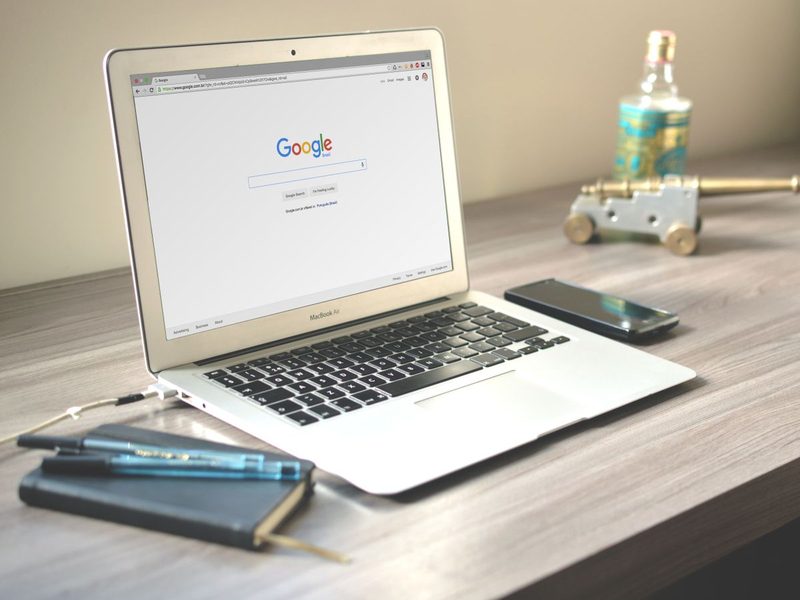 Laptop showing Google search, check how Ottawa businesses appear in AI and search results
